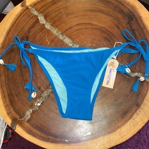 Turquoise tie swim bottoms with seashells. Size M
